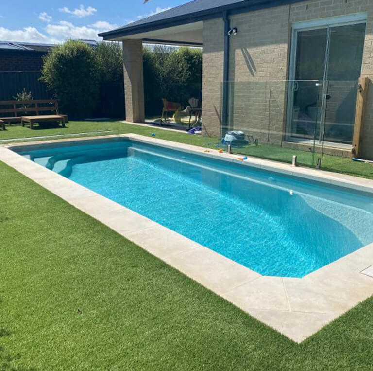 London Grey, Egyptian Limestone tiles used for pool coping