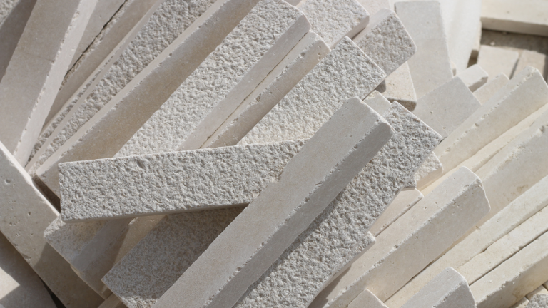 Bush hammered white pearl limestone